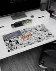 Naruto Uzumaki and team hidden in manga chaos with orange Naruto logo, mouse pad 32x16 inches.