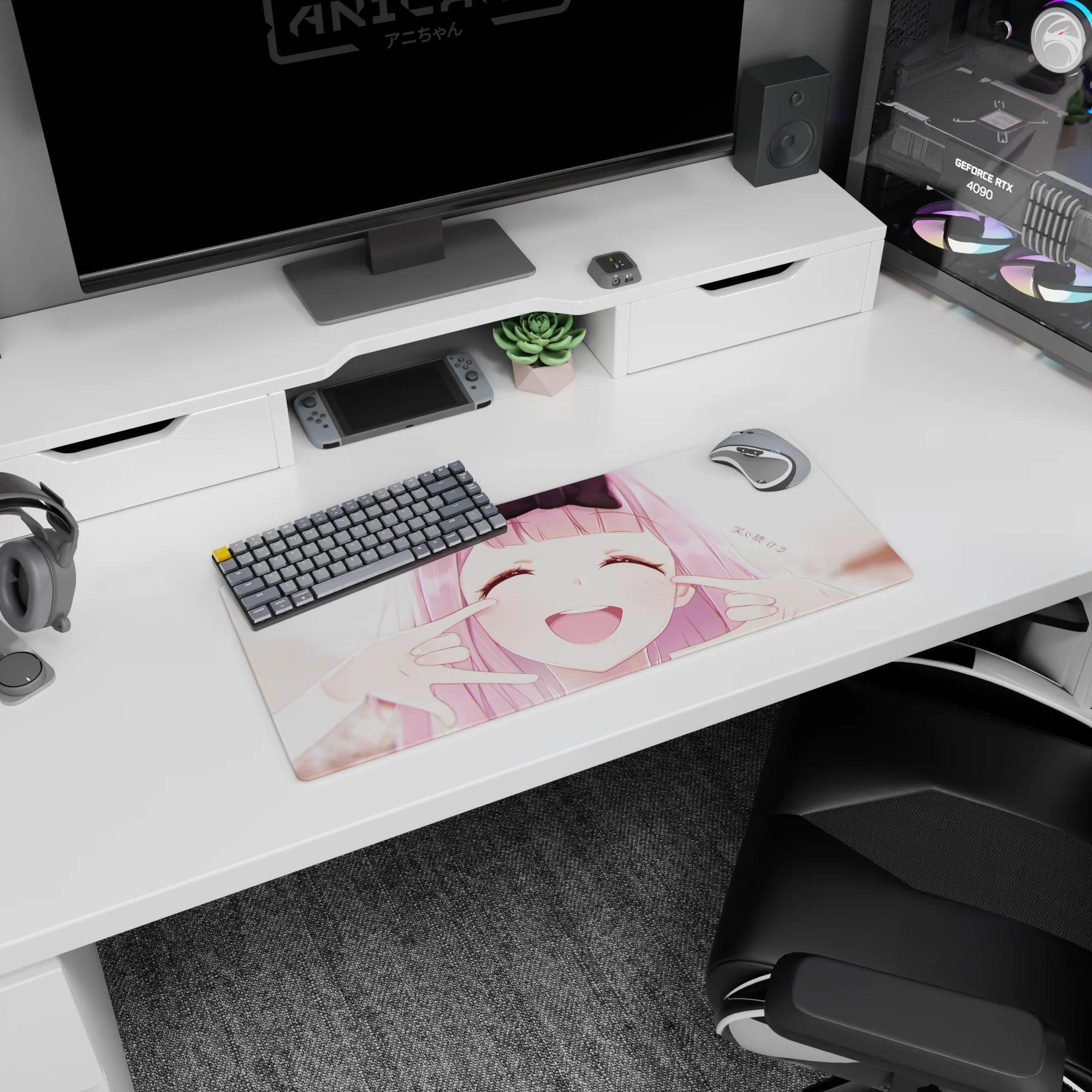 28x12 inches anime mouse pad showing bow-wearing pink-haired girl, cheeks squished into a happy grin.