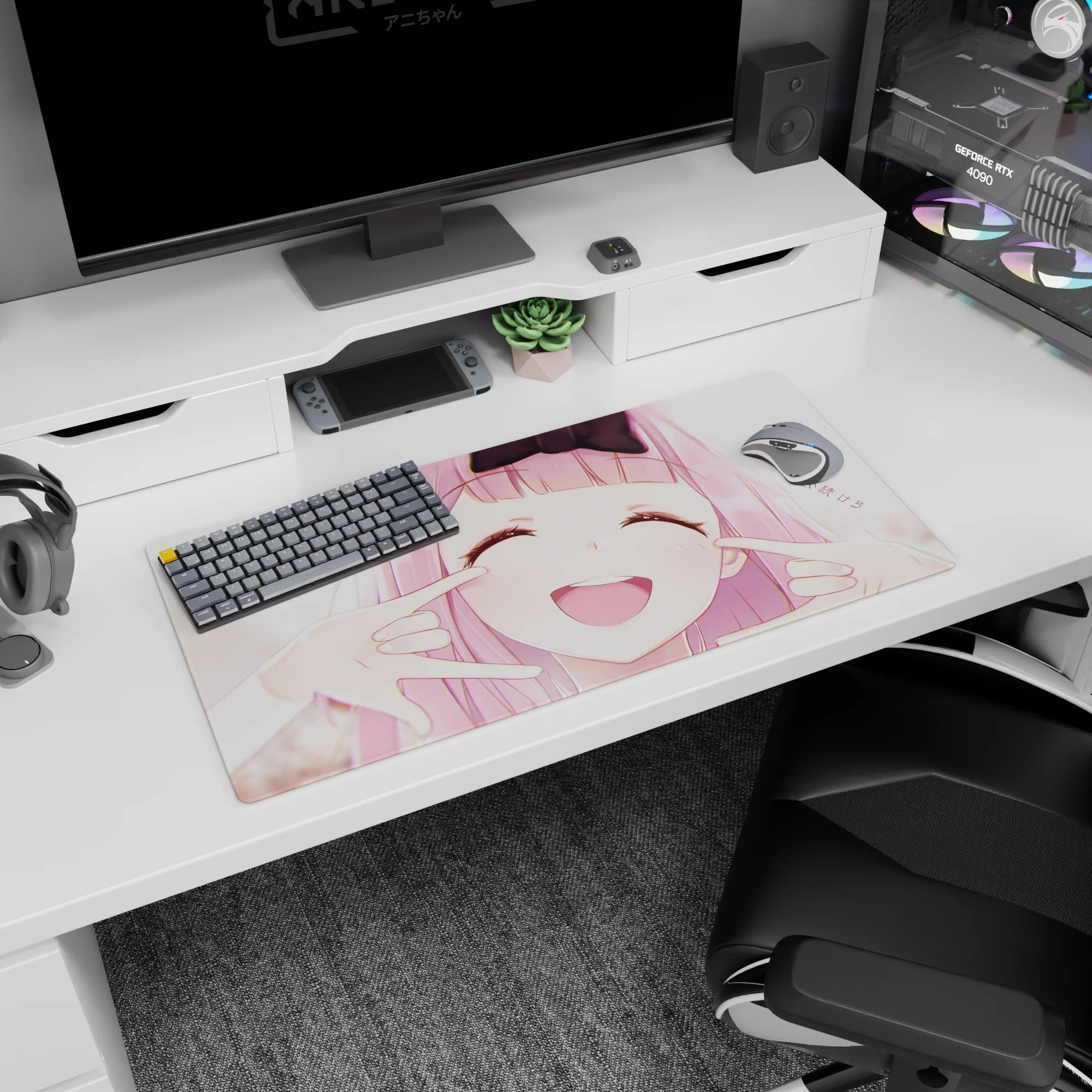 32x16 inches anime desk mat featuring a pink-haired girl with cheeks squished into a big grin.