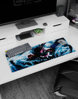 Anime mouse pad 32x12 inches showing a hooded warrior reaching out, power pulled from the air.