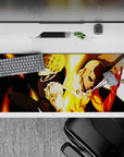 36x16 inches anime desk pad in hot gold light on dark backdrop, sleek metallic highlights, calm focus vibe.