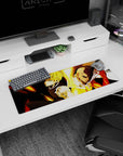32x12 inches One Punch Man mouse pad showing Saitama’s cape and Genos’ cyber arms in a back-to-back pose.