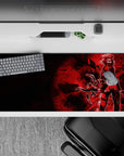 36x16 inches anime desk pad in deep crimson and shattered black, moody red glow, edgy street-battle vibe.