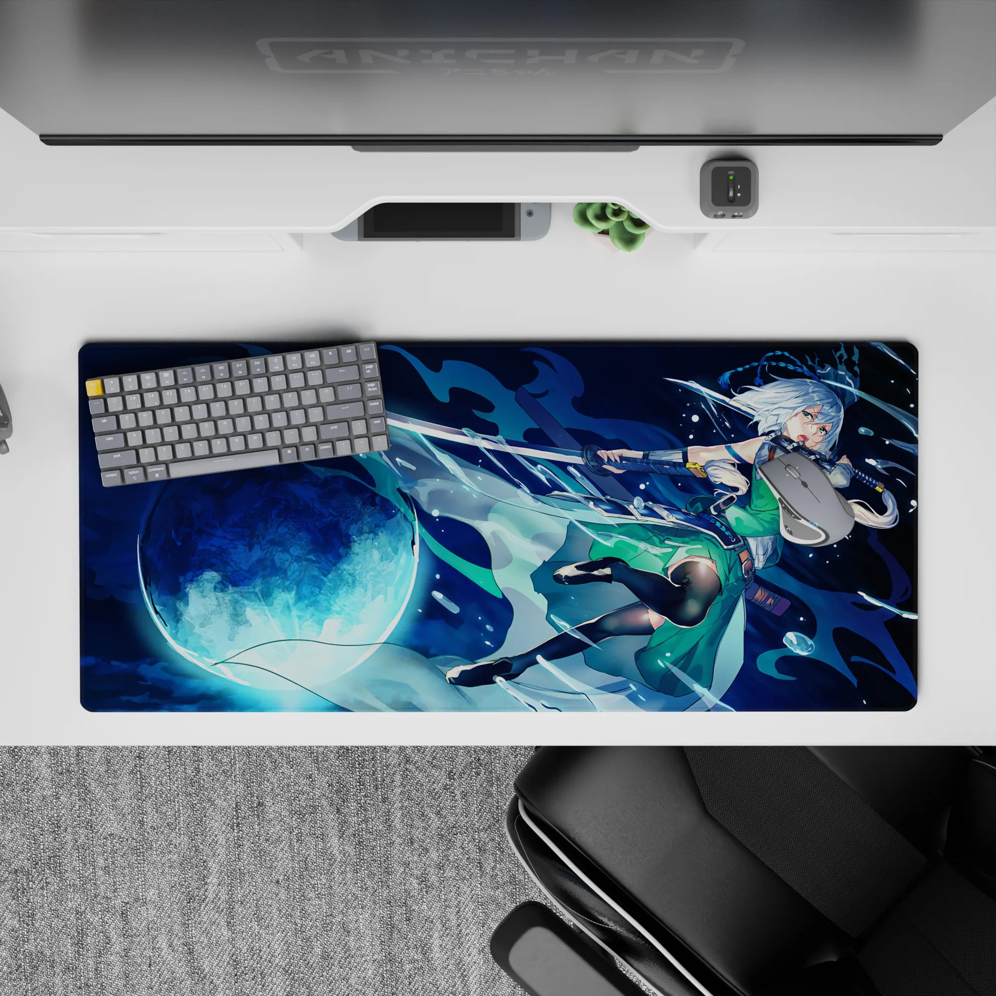 Moody navy and aqua anime desk pad 36x16 inches with bright full moon glow and icy blue splashes.