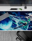 Night-blue anime desk pad 40x20 inches in icy aqua splashes, full moon glow, and watery motion.