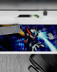 36x16 inches anime desk pad in neon blue, red and black, with high-contrast arcade energy and motion lines.