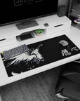 36x16 inches anime desk pad showing a sporty angel mid-leap, arms spread, hair whipping, giant wings.