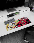 Two flipping sporty anime heroines on a desk mat mouse pad 28x12 inches, glossy pop-art backdrop.