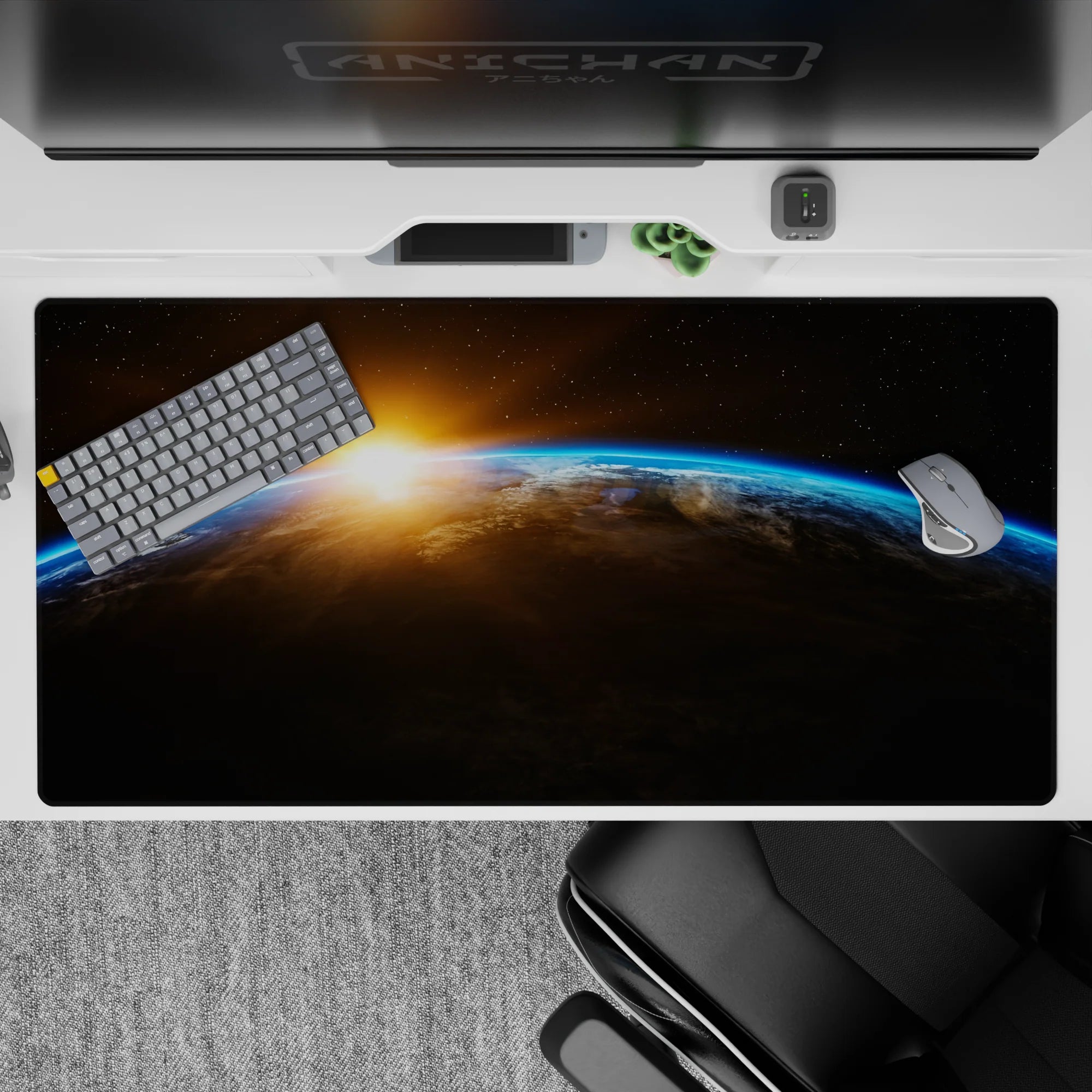 Chill orbit mood desk pad 40x20 inches with deep black stars, warm orange glow and electric blue edge.