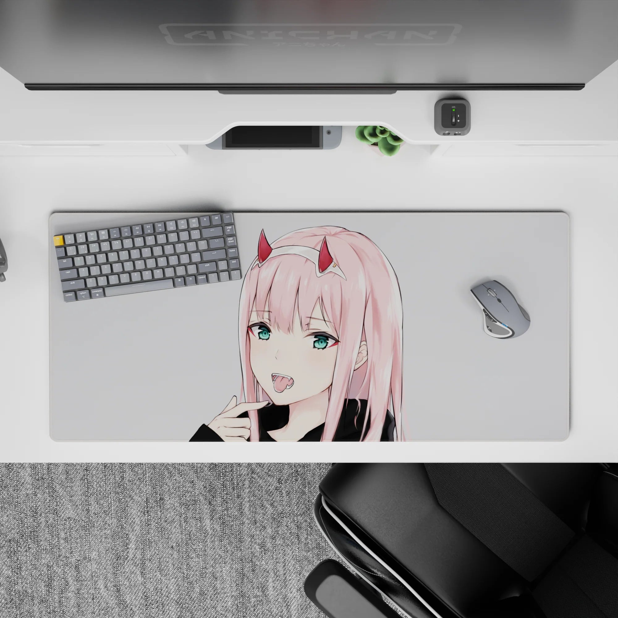 Striking 36x16 mouse pad highlights Zero Two’s fanged grin, radiant teal eyes, and clean lines in stunning visual simplicity