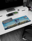 Mikazuki Augus and Orga Itsuka lineup beside towering Barbatos desk mat anime mouse pad 32x12 inches.