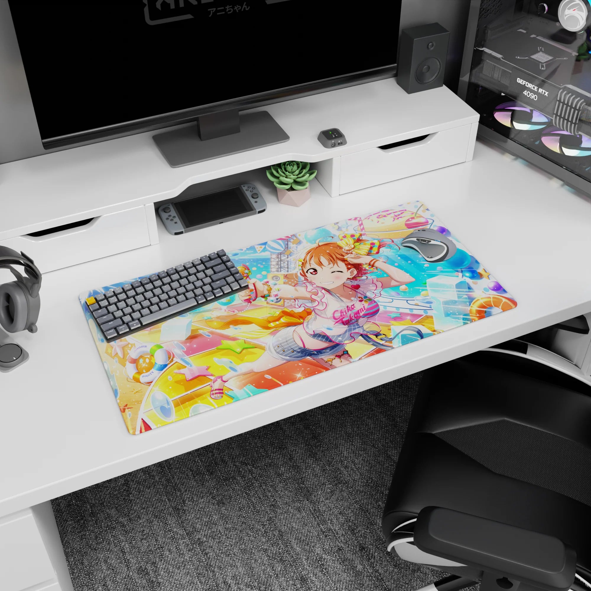 32x16 inches anime girl mouse pad showing a winking orange-haired girl spraying a cute water gun amid starbursts.