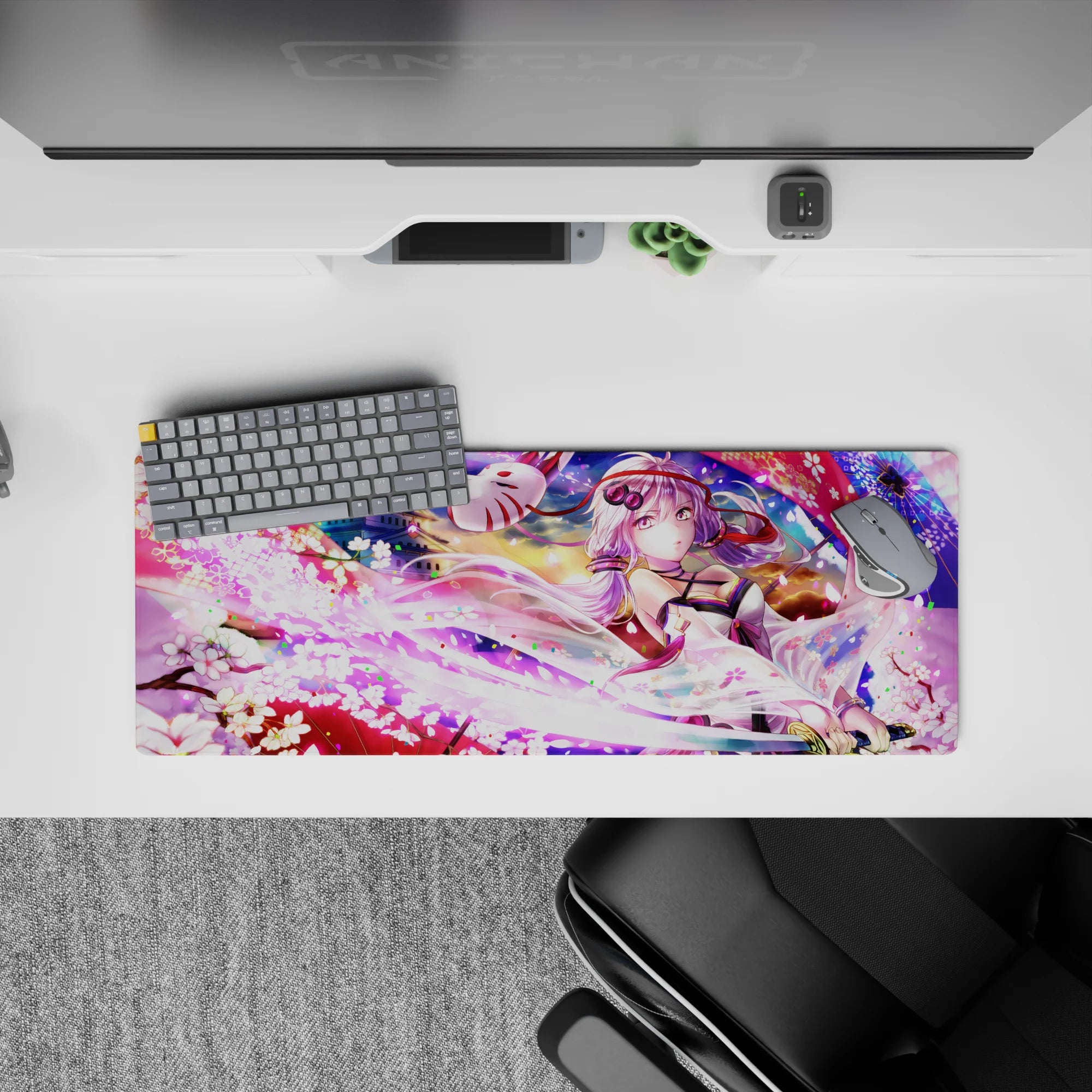 32x12 inches anime desk mouse pad in neon pinks and soft violets, dreamy festival vibe with falling petals.
