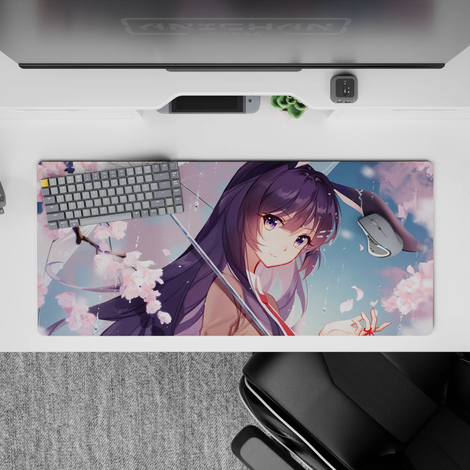 Pastel spring romance desk pad 36x16 inches in pink sakura tones, soft rain droplets, dreamy anime vibe.