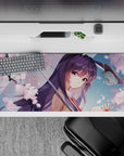 Pastel spring romance desk pad 36x16 inches in pink sakura tones, soft rain droplets, dreamy anime vibe.