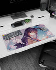 32x16 inches anime girl mouse pad featuring shy smiling girl under umbrella, flowing purple hair in rain.
