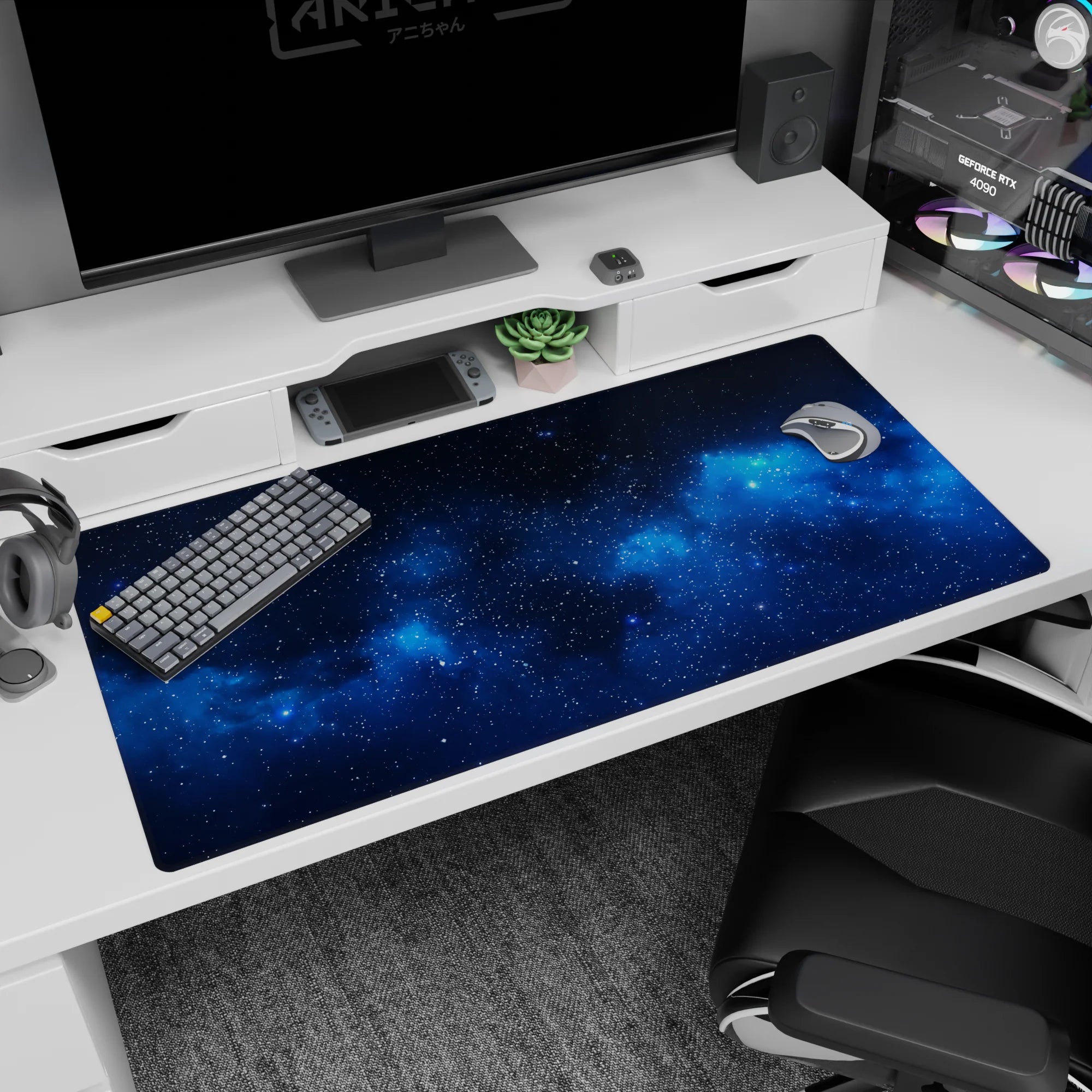 Starfield nebula scene desk pad 40x20 inches featuring tiny white stars over deep night-sky blues.