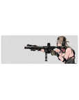 Anime girl mouse pad 32x12 inches with tan cap, chunky headset, and sleek black rifle on pale background.