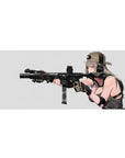 36x16 inches anime girl desk pad with tan cap, chunky headset, and black rifle on a clean pale backdrop.