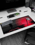 36x16 inches Naruto desk pad showing Sasuke Uchiha with a lone blade beneath a huge red sun.
