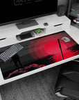 40x20 inches anime desk pad showing Sasuke Uchiha by rippling water, lone blade under a huge red sun.
