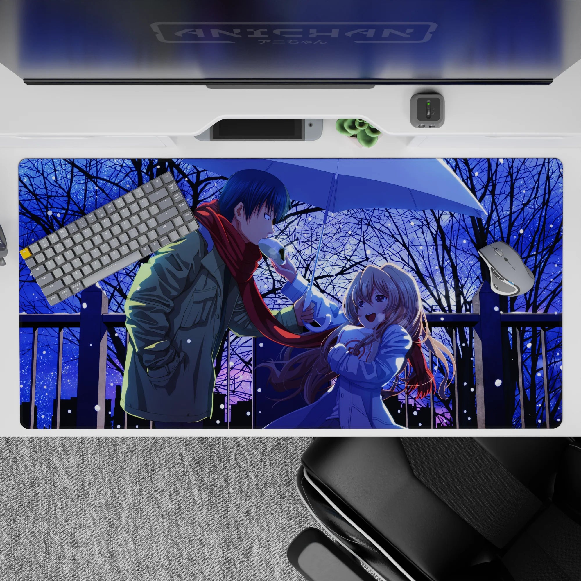 40x20 inches anime desk pad in deep midnight blues, soft snow sparkle, cozy romantic mood, red scarf pop.