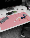 Anime girl desk pad 40x20 inches showing hoodie girl drifting sideways with peach backpack, socks, sneakers.