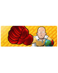 One Punch Man anime mouse pad 32x12 inches with Saitama glove punch, yellow suit, white cape, orange text.