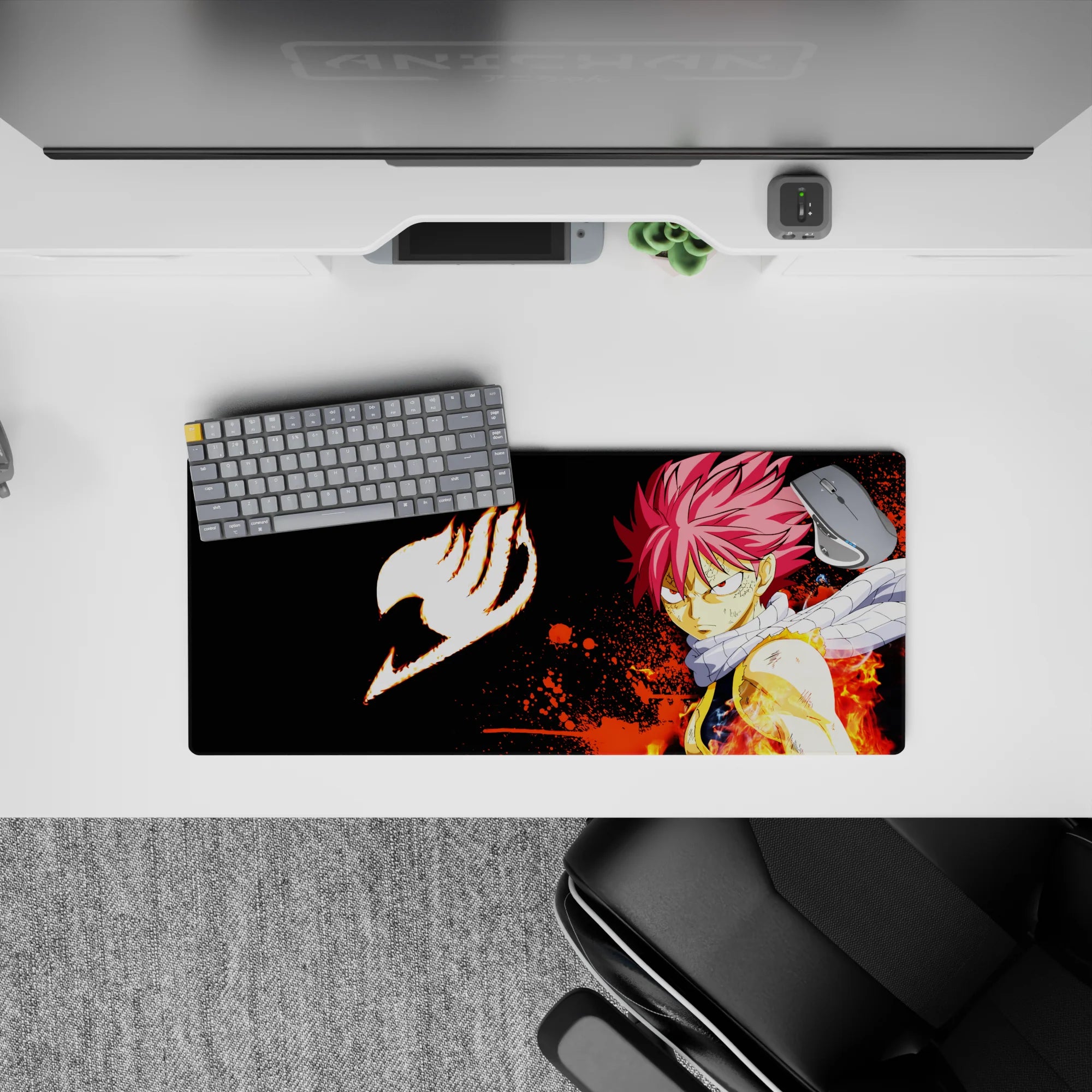 28x12 inches anime mouse pad in black with orange flame bursts for a fiery, high-energy gaming vibe.