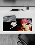 28x12 inches anime mouse pad in black with orange flame bursts for a fiery, high-energy gaming vibe.