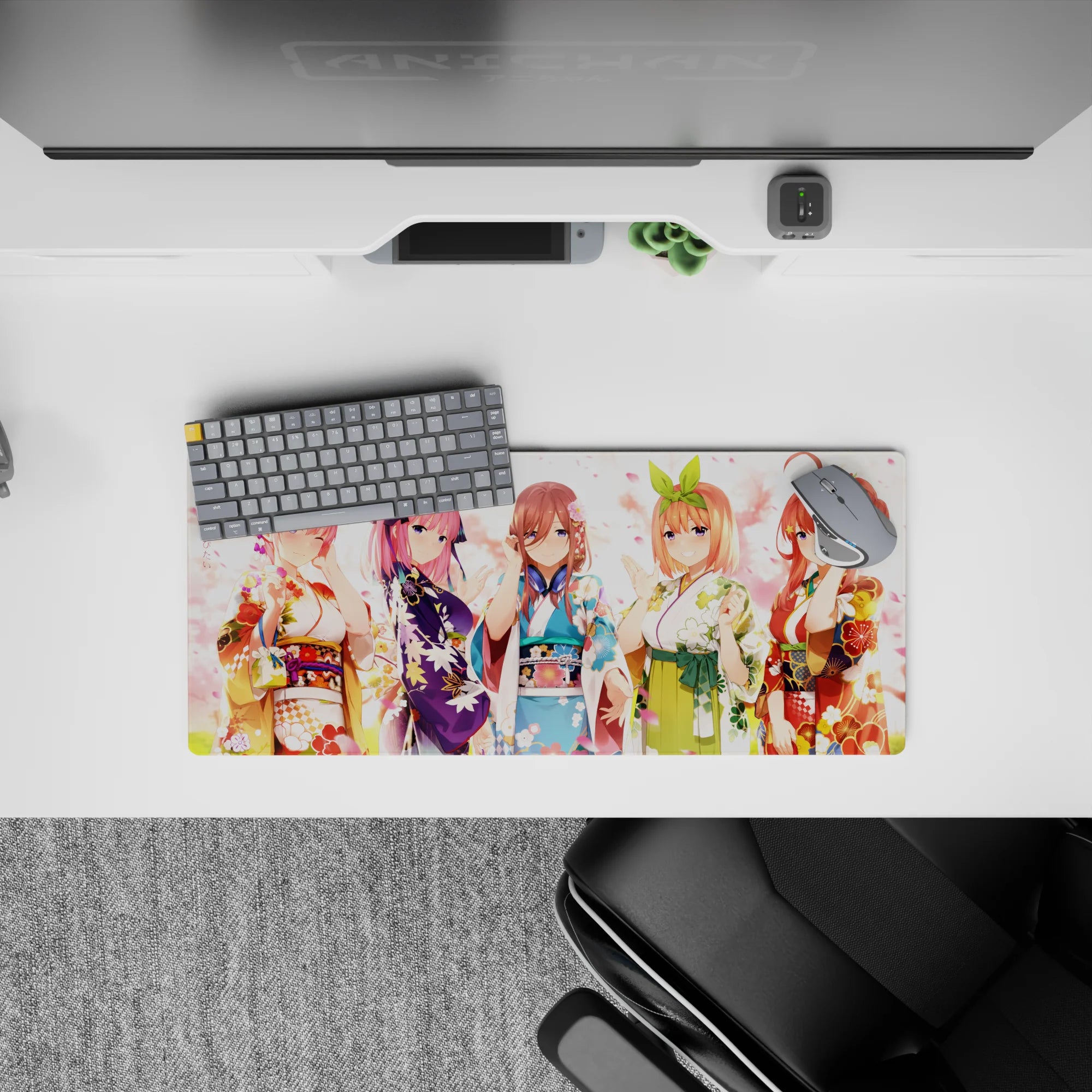 Cute anime girl mouse pad 28x12 inches in soft pink light with violet, sky blue, green, and warm red florals.