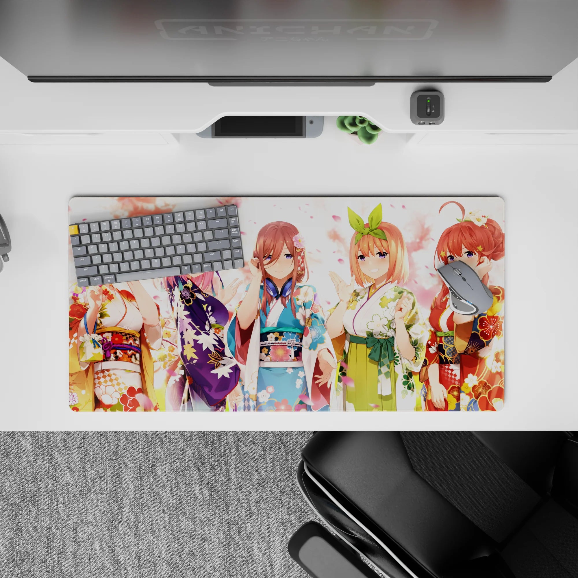 32x16 inches anime girl mouse pad in soft creamy light with pink petals, violet, sky blue, green and red.