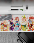 36x16 inches kawaii anime desk pad in creamy light with pink petals, violet and sky blue florals, sunny mood.