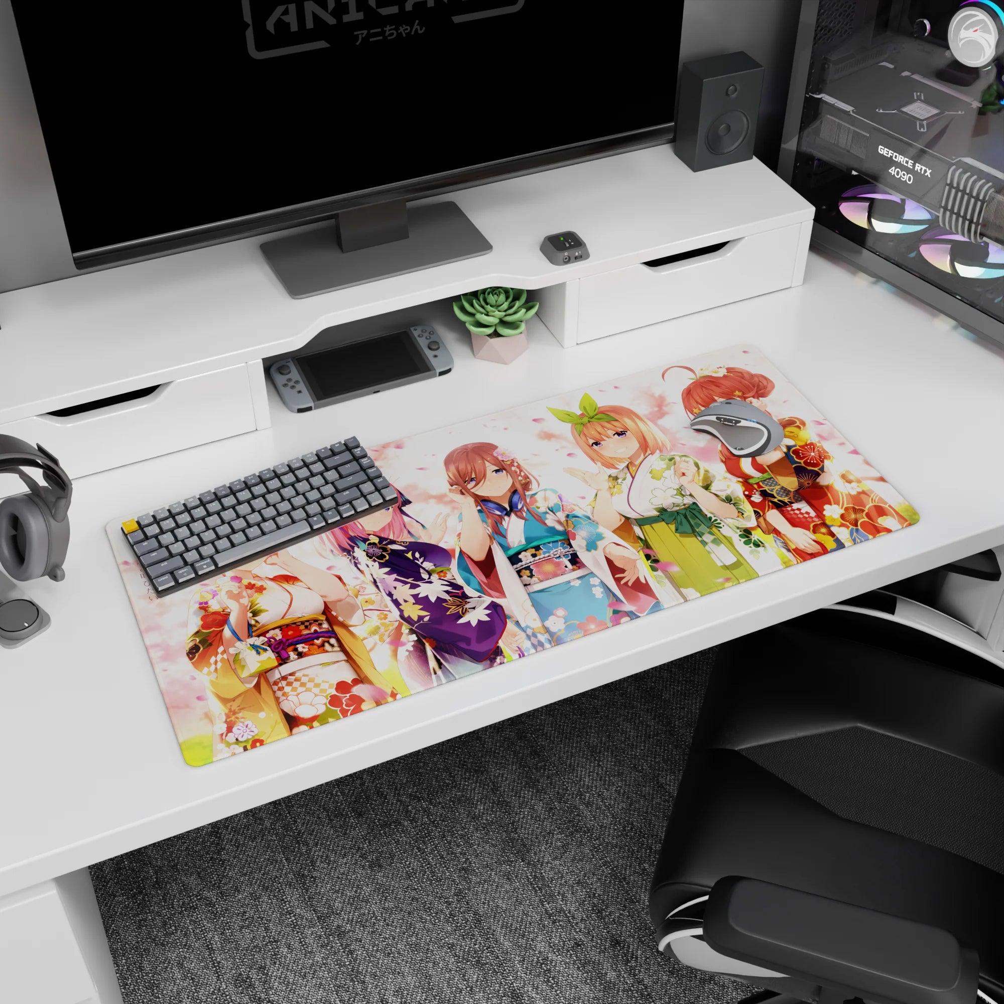 36x16 inches anime desk pad scene of five smiling kimono girls amid drifting pink petals like a tiny festival.