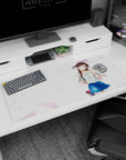 36x16 inches desk pad showing a chestnut twin-tail anime girl waving, big shiny eyes, airy backdrop.