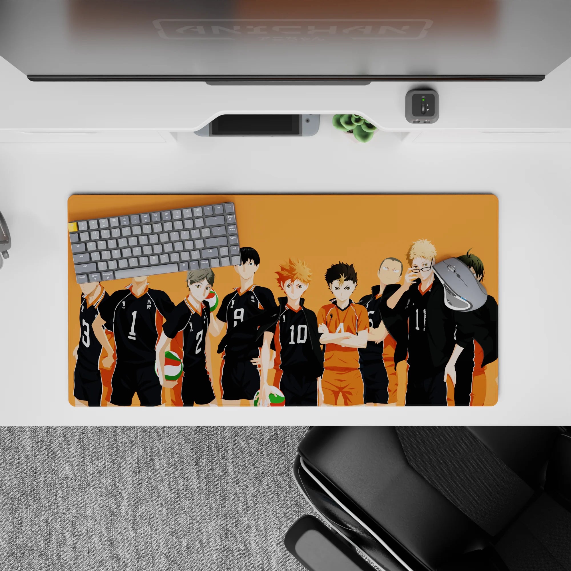 Sunset-orange gym vibe anime mouse pad with bold black jerseys and spark-orange libero, 32x16 inches.