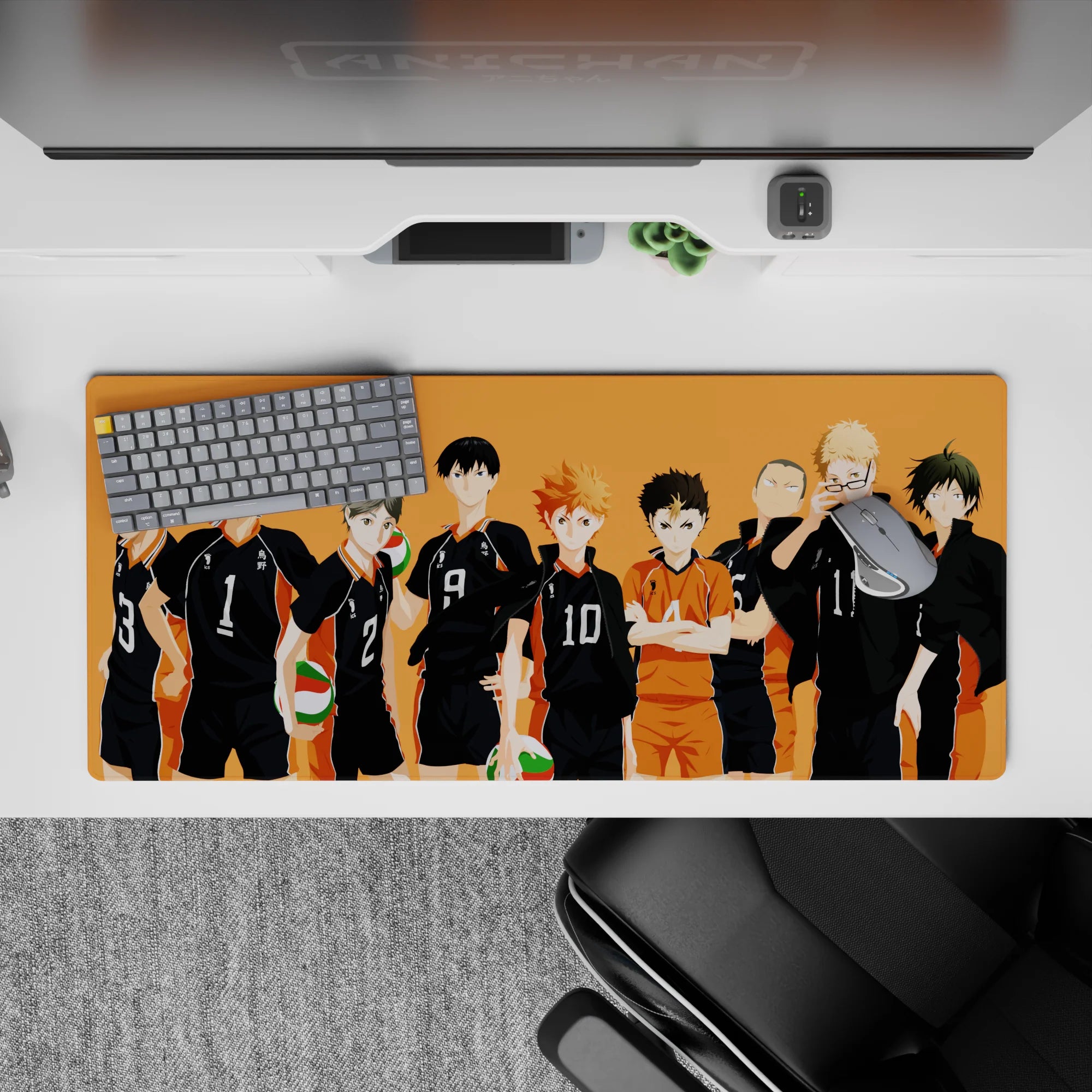 Sunset-orange gym backdrop anime desk pad 36x16 inches, bold black lineup and punchy green-red balls.