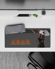 Pink-haired cyberpunk vibe mouse pad 28x12 inches in gray, black, and orange with bold poster-style kanji.