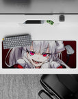 32x12 inches anime desk mat in deep crimson with hot pink eyes, bold contrast, playful demon-girl vibe.