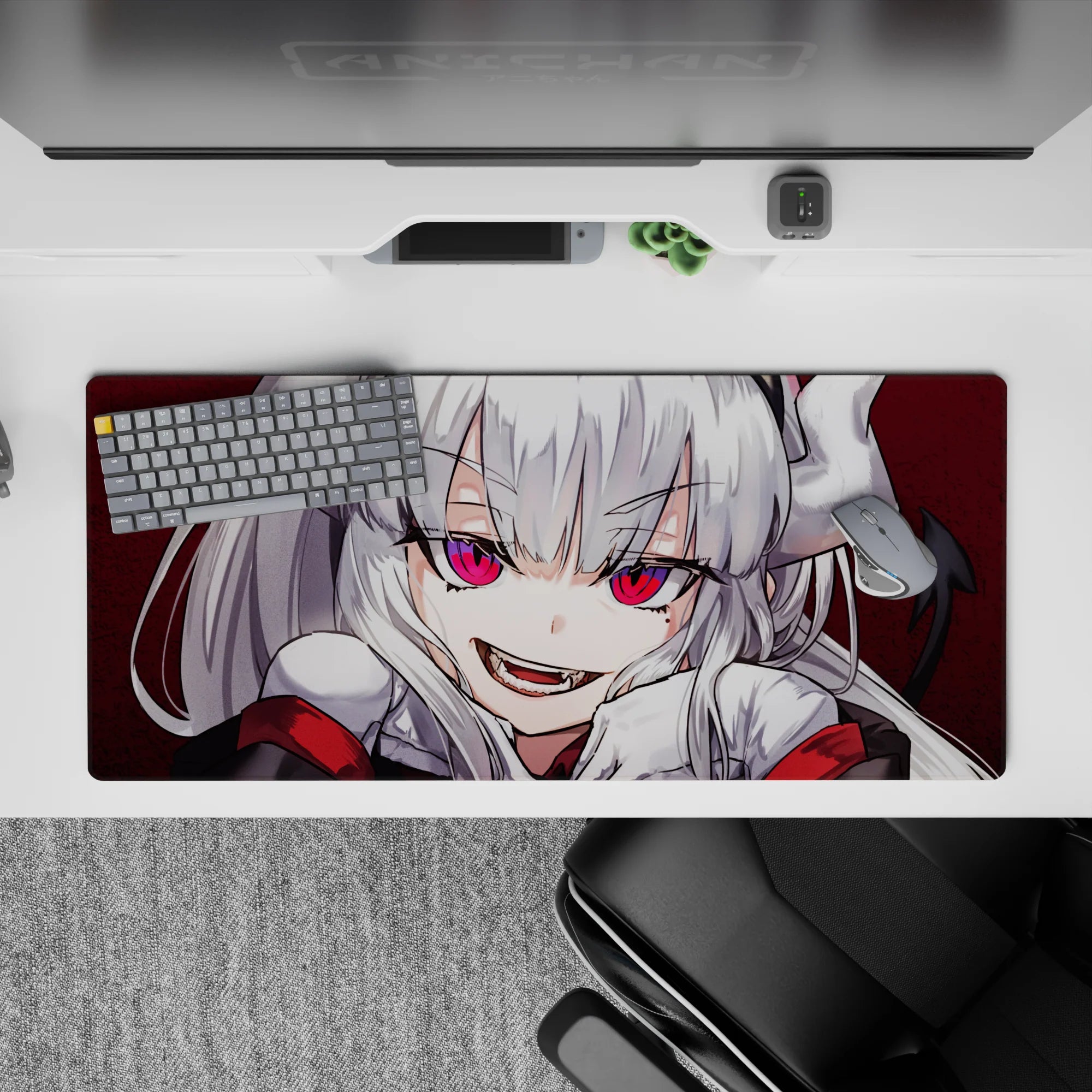 Dark crimson anime desk pad 36x16 inches with hot pink eyes, bold contrast, playful demon-girl vibe.