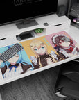 KonoSuba desk pad 40x20 inches featuring Aqua, Darkness, and Megumin in pastel maid cafe theme; vibrant anime decor.