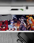 36x16 inches anime girl desk pad in ruby red, icy blue, midnight black, and sunlit gold energy.