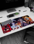 36x16 inches anime girl desk pad showing red-cloaked fighter, white-haired beauty, swordswoman, blonde brawler.