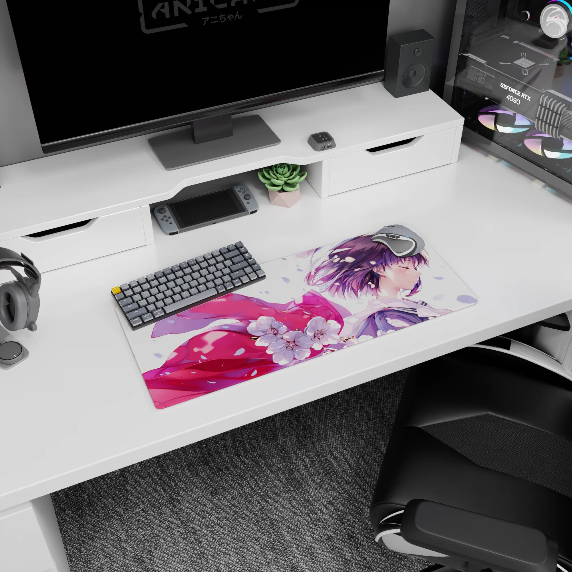 Anime girl in a breezy cherry blossom scene mouse pad 28x12 inches, glossy pink ribbon flowing behind.