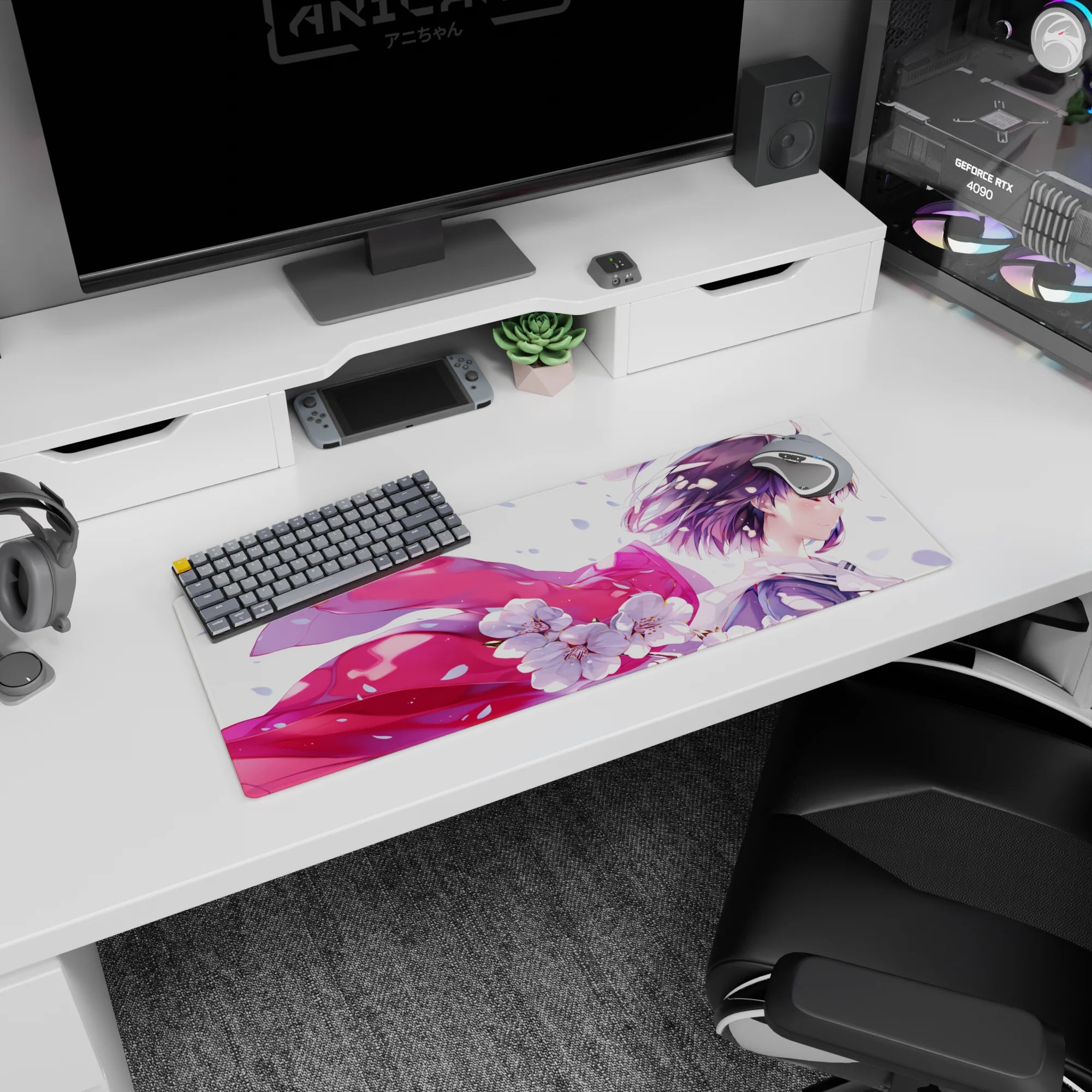 32x12 inches desk mat showing smiling anime girl in breeze, glossy pink ribbon trailing through cherry blossoms.