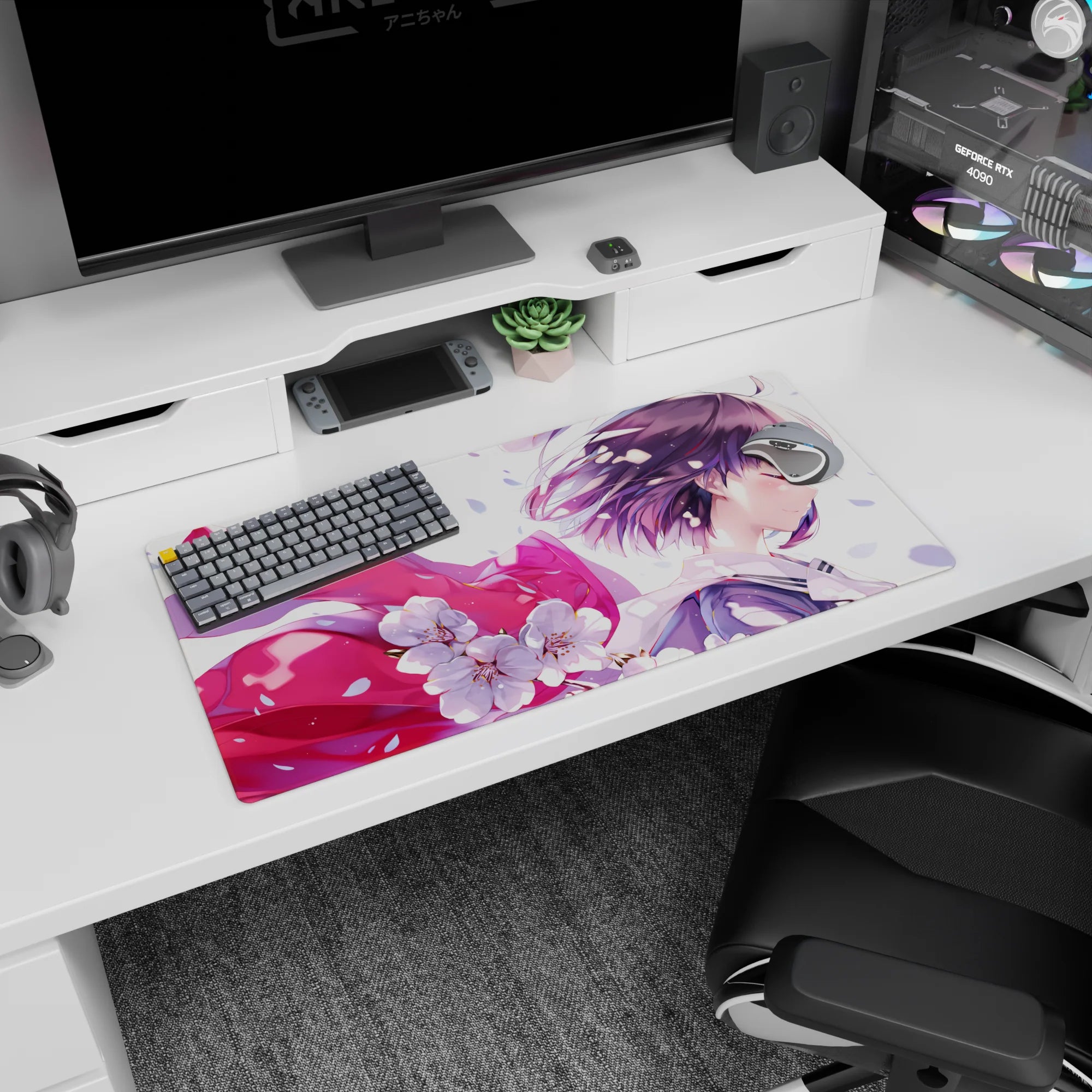 32x16 inches desk mat showing a smiling anime girl, hair in the breeze under bright white cherry blossoms.