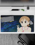Cute midnight-blue swirl anime mouse pad 32x16 inches, creamy top and rosy accents for happy vibes.