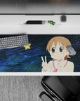 Cute pastel anime desk pad 36x16 inches in cream, rosy red, sandy-brown hair, deep blue swirls, bright star.