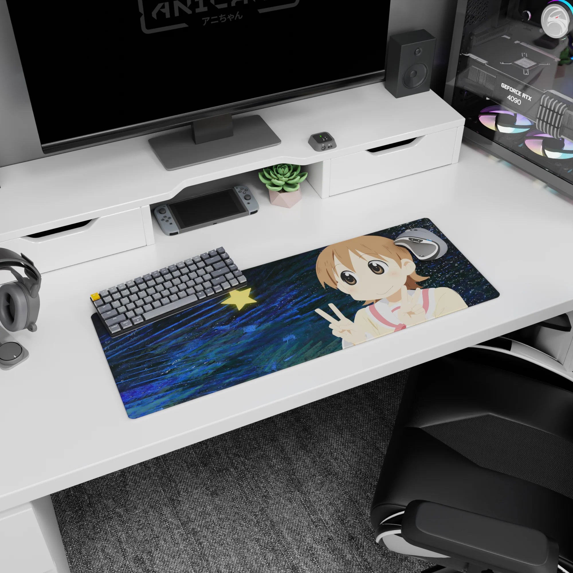 Big-eyed anime girl desk mat 32x12 inches, pink cheeks and sandy hair, flashing peace signs on dark swirls.