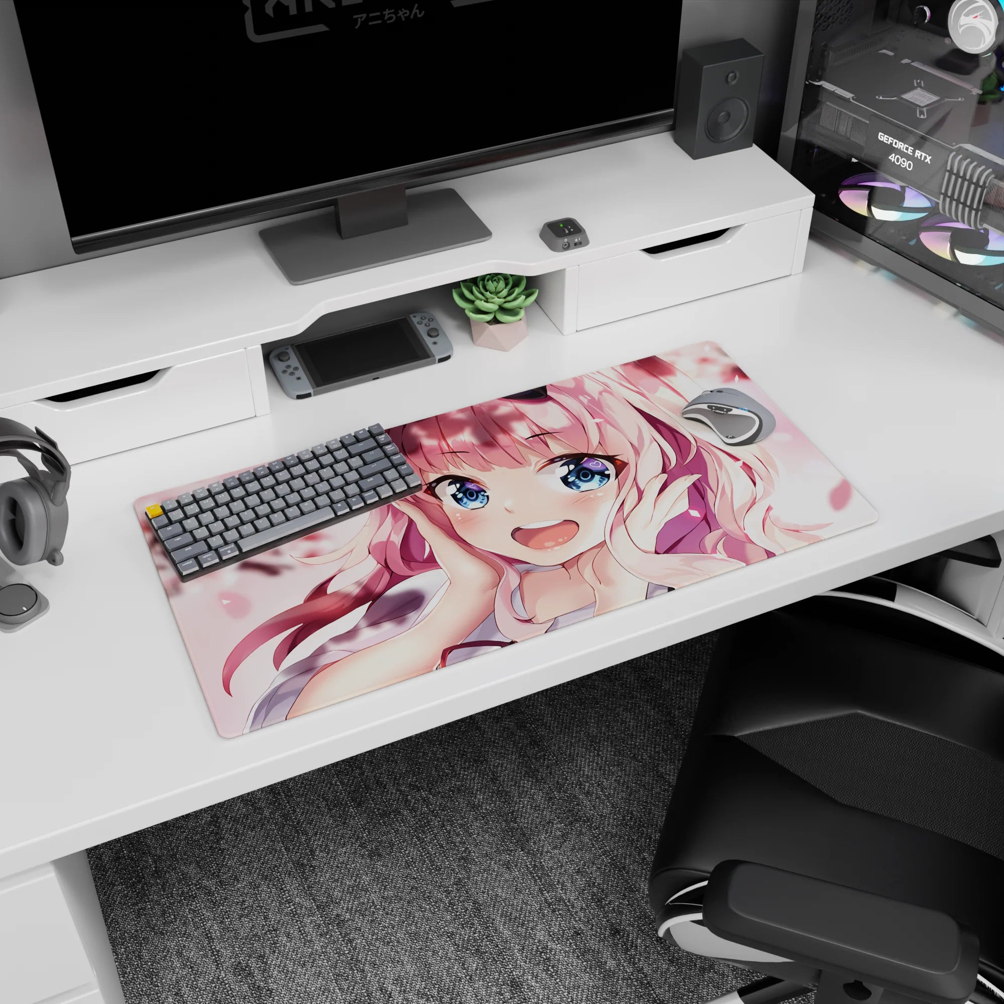 32x16 inches desk mat showing a bubbly pink-haired anime girl with heart highlights in her sky-blue eyes.